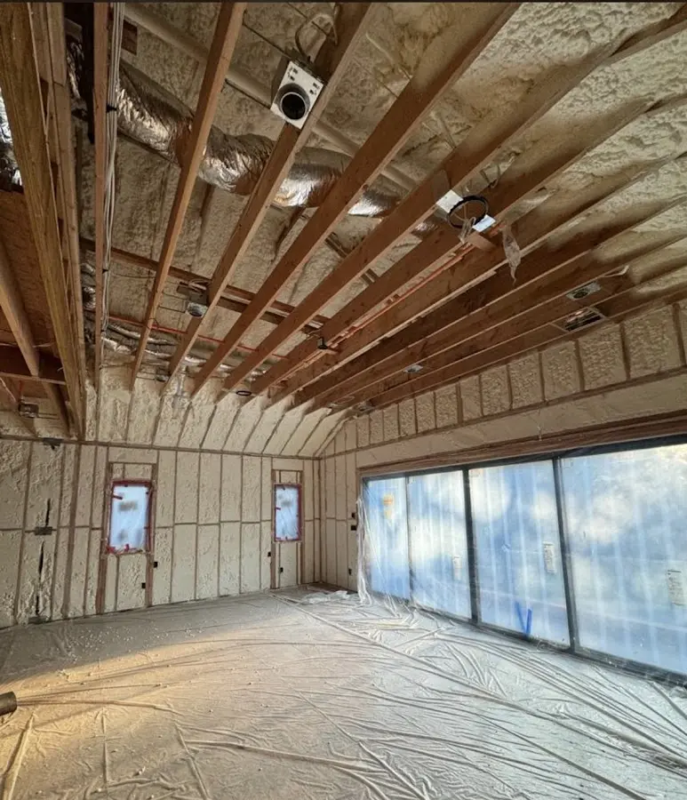 Interior walls and ceiling insulated with spray foam during new construction in Chippewa Falls